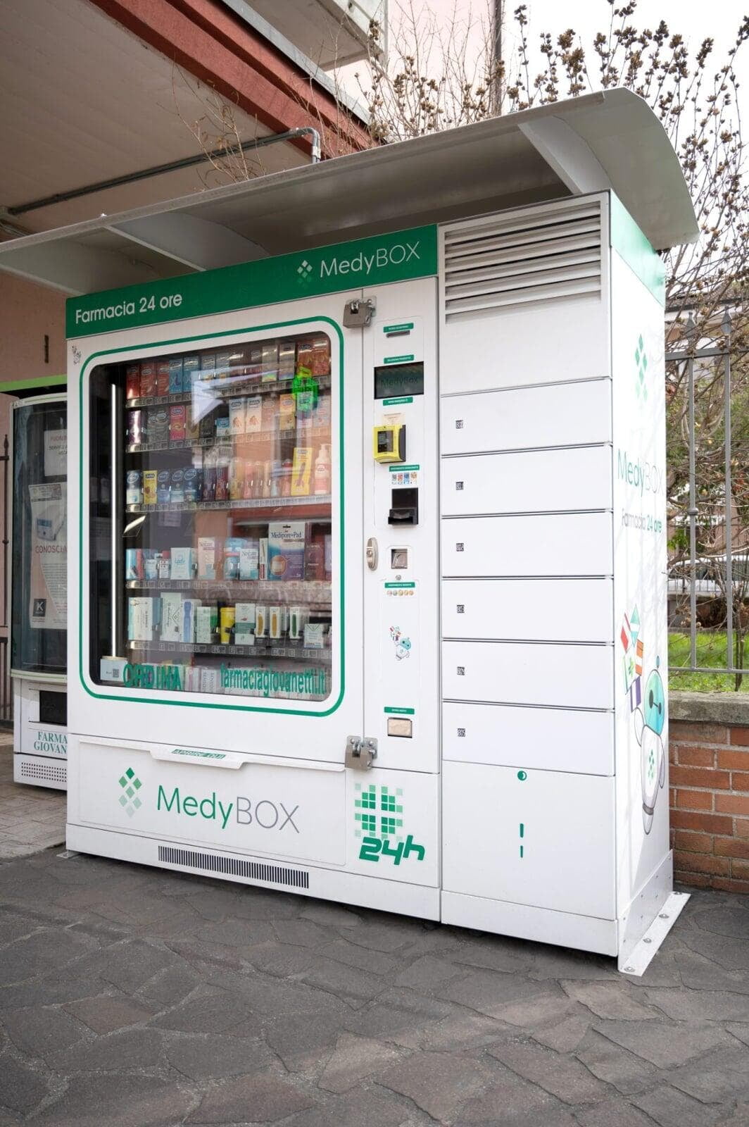 Medybox locker and attached refrigerated add-on unit positioned outside a pharmacy, offering a secure and convenient 'click and collect' system for the safe pickup of prescriptions and temperature-sensitive pharmacy products